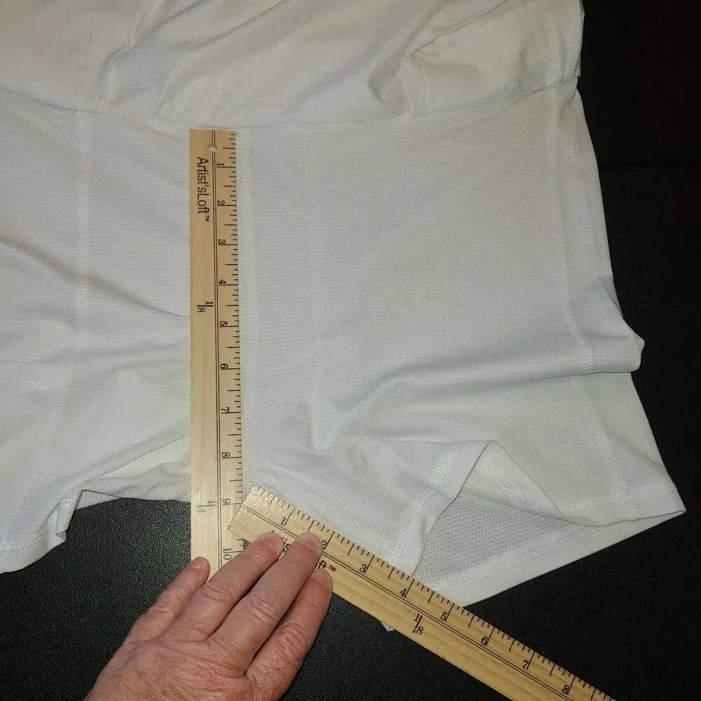 Greg Norman White Golf Skort Tennis Athletic Sz S UPF 30+ Stretch Pockets Preppy